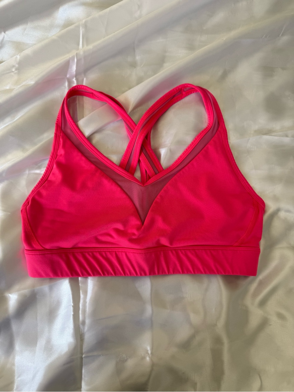 Lululemon Womenโs Crisscross V-Detail Sports Bra in Hot Pink